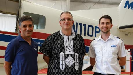 Leon, Ulrich and Ed celebrating Ulrich's last moment in Liberia