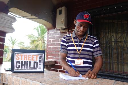 Abednego V. Johnson leads the office of Street Child of Liberia in Harper and Team, Maryland County