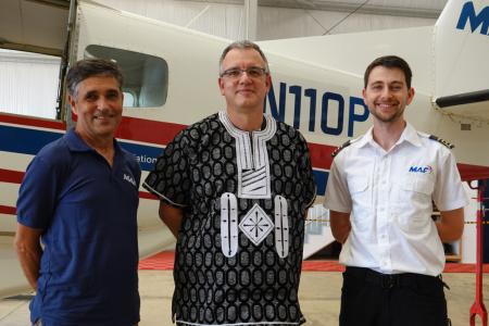 Leon, Ulrich and Ed celebrating Ulrich's last moment in Liberia