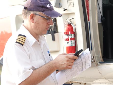 Ulrich Muller MAF Liberia Pilot and James Kuma 