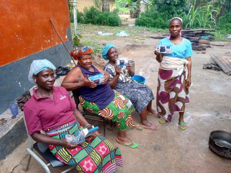 Cooks listening to audio scripture units